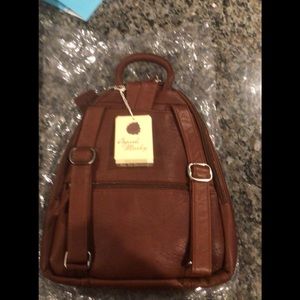 Osgoode Marley Teardrop multi zip backpack purse